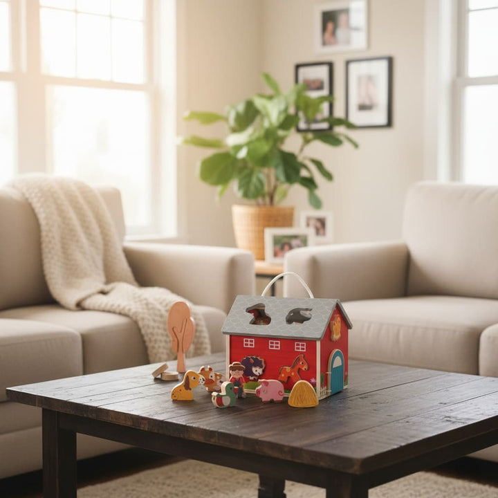Living room with beige sofas, a wooden coffee table, and children's toys.