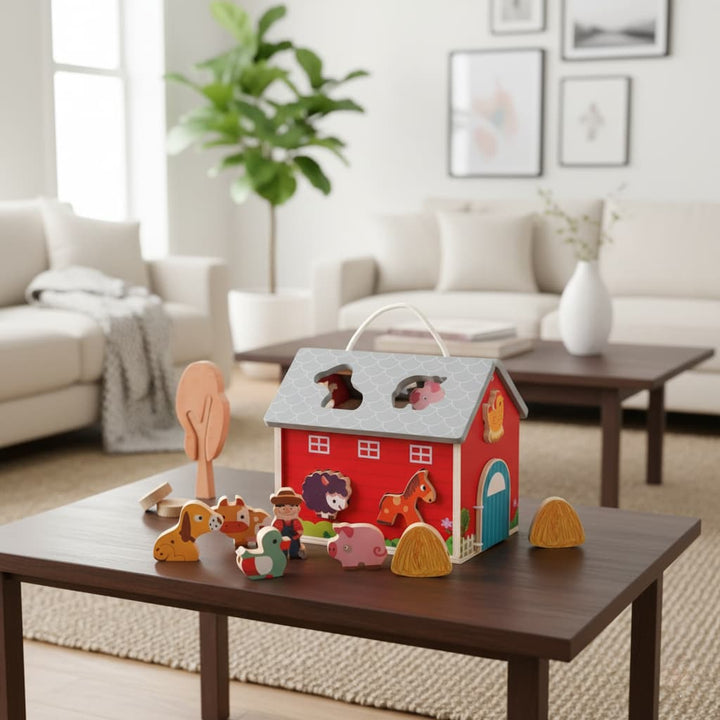 Wooden farm toy set on a coffee table in a living room