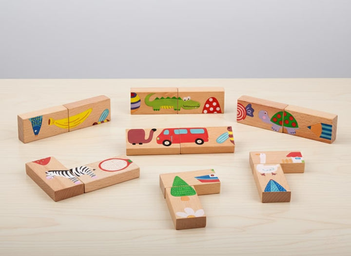 Set of wooden blocks with animal illustrations on a light background