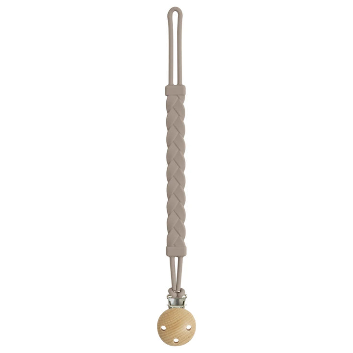 Beige braided cord with a wooden bead on a white background