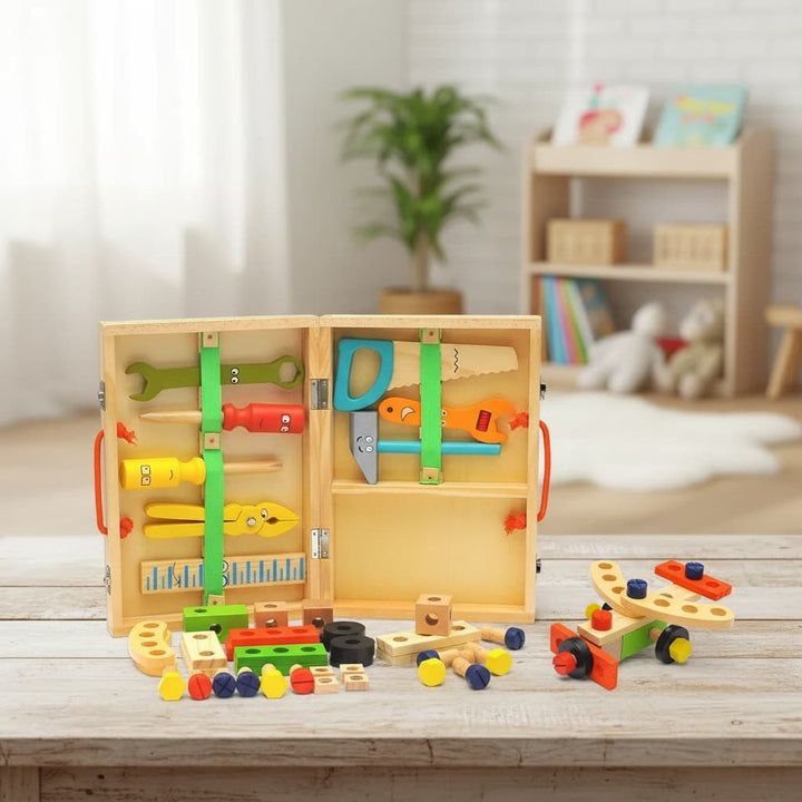 Wooden tool set with tools and accessories on a wooden table in a room setting.
