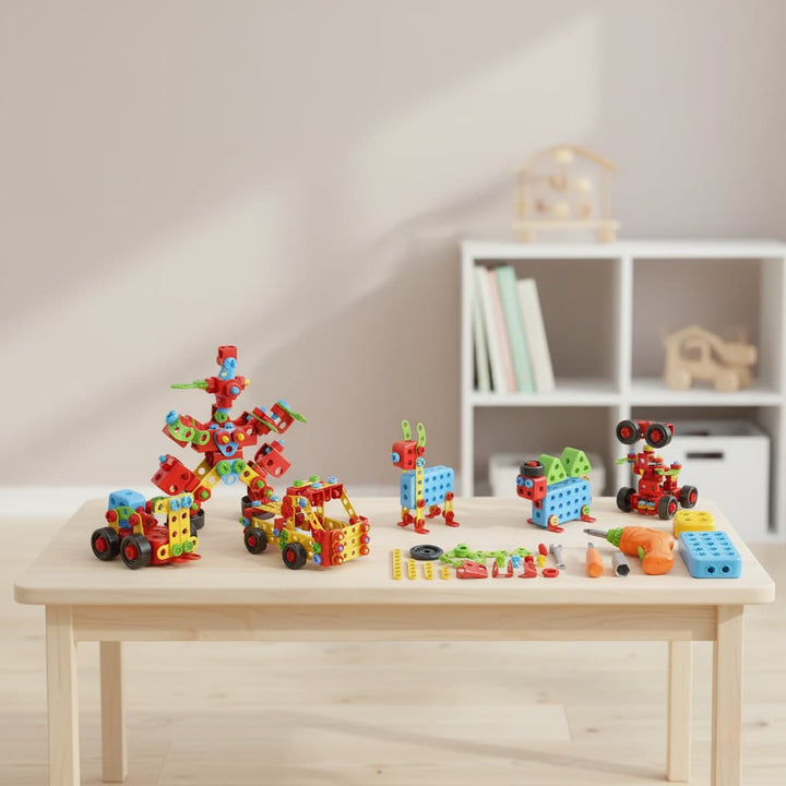 Colorful building blocks on a wooden table with a neutral background