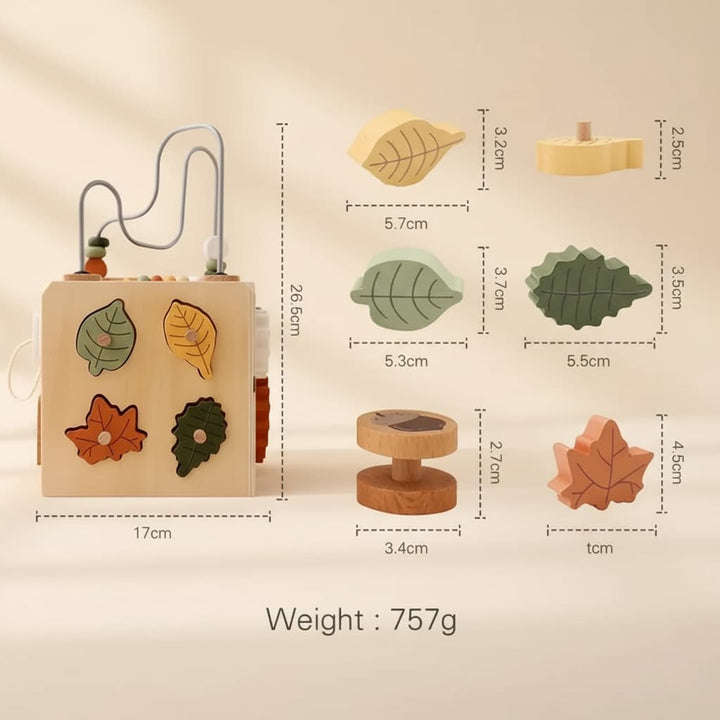 Wooden toy with leaf-shaped pieces and measurements on a beige background
