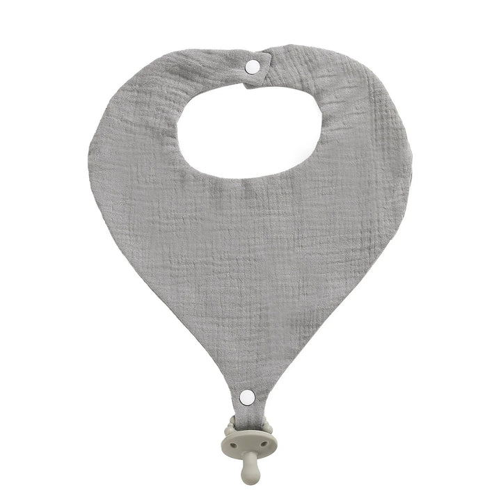 Gray baby bib with a pacifier clip on a white background