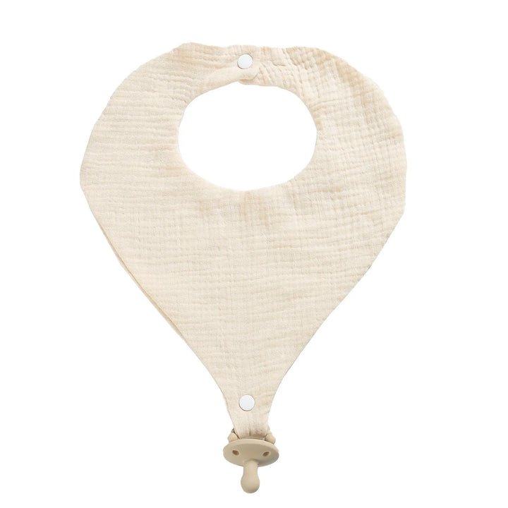 Beige baby bib with a soft texture on a white background